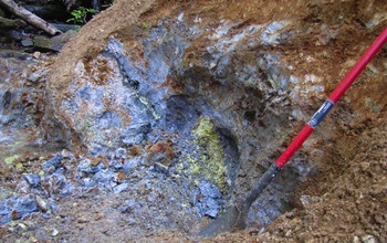 Outcrop of antibacterial blue clay and elemental sulfur (yellow) in a volcanic sulfide deposit.